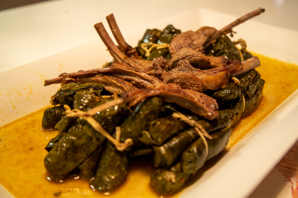 A plate of food with meat and vegetables on it.