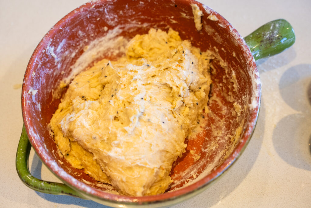 A table with bowls and plates of food