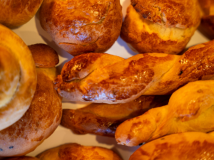 A close up of some bread rolls on the table