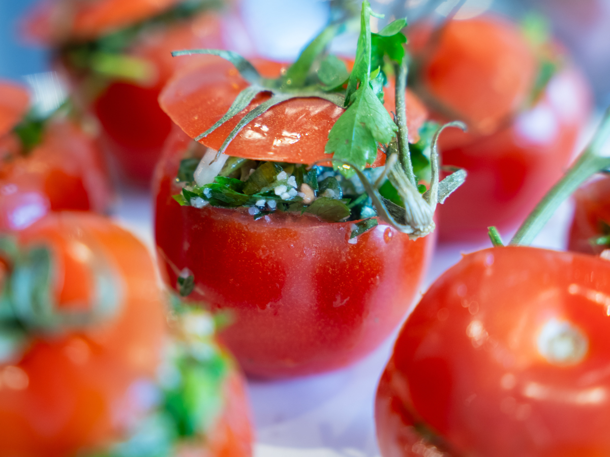 A close up of some tomatoes on the table