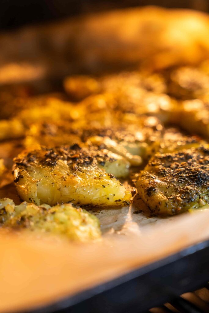 A bunch of potatoes and green beans on the table