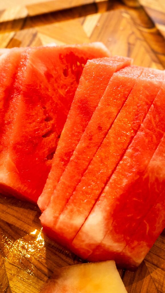 A close up of slices of watermelon on a plate